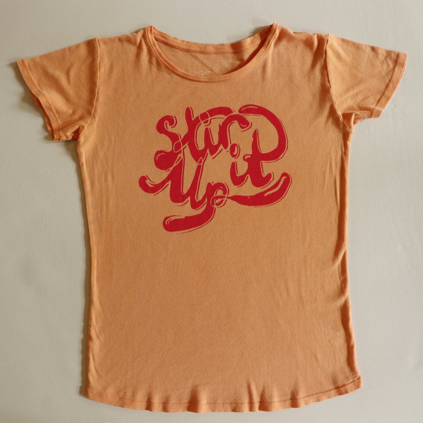 STIR IT UP ORANGE TEE