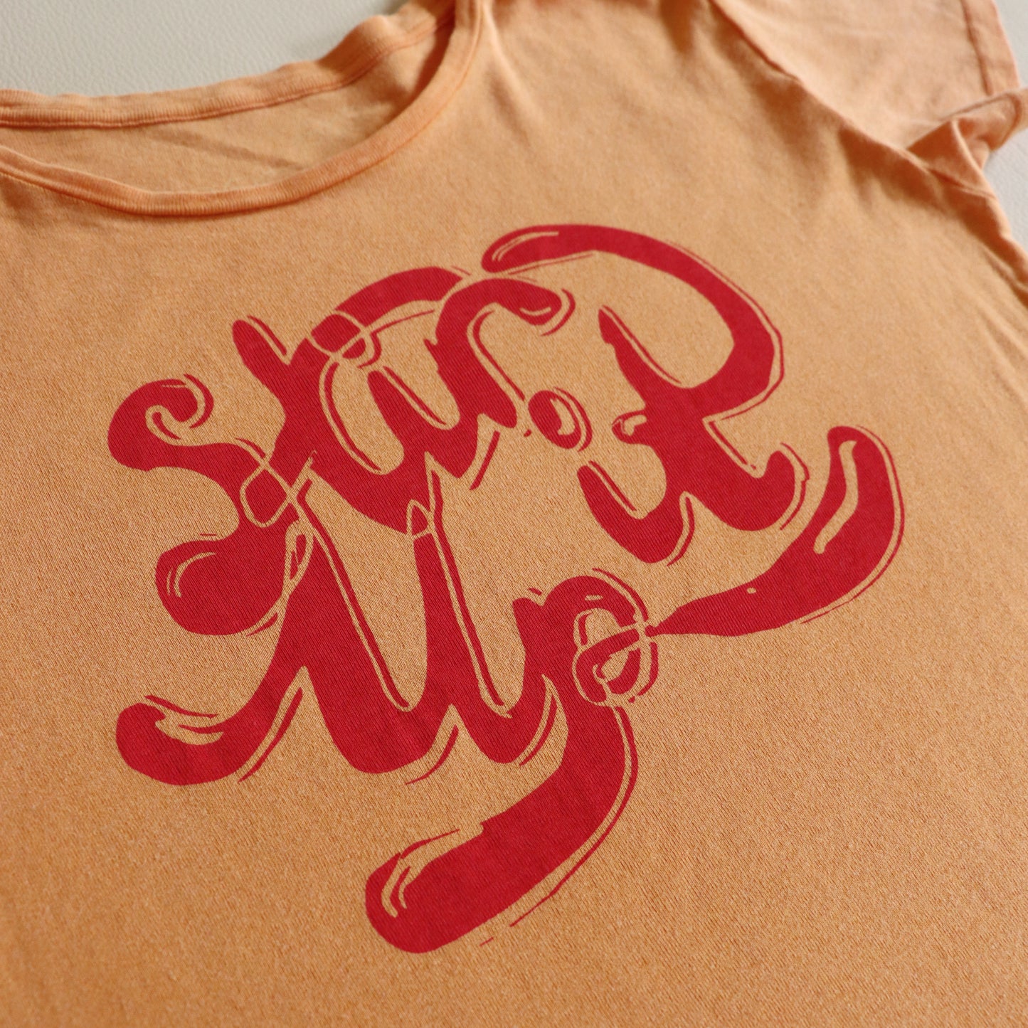 STIR IT UP ORANGE TEE