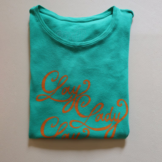 LAY LADY LAY ORANGE ON GREEN TEE SHIRT